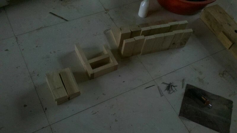 Handmade wooden support pieces prepared for the build